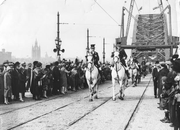 The Northern Echo: The royal procession passing over the Tyne Bridge during the opening ceremony on October 10, 1928
